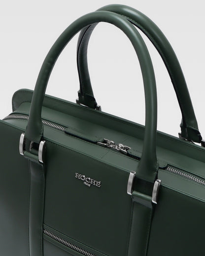 Close-up of PinnaclePro olive green genuine leather laptop bag, highlighting rich leather texture, precision stitching, and custom metal hardware