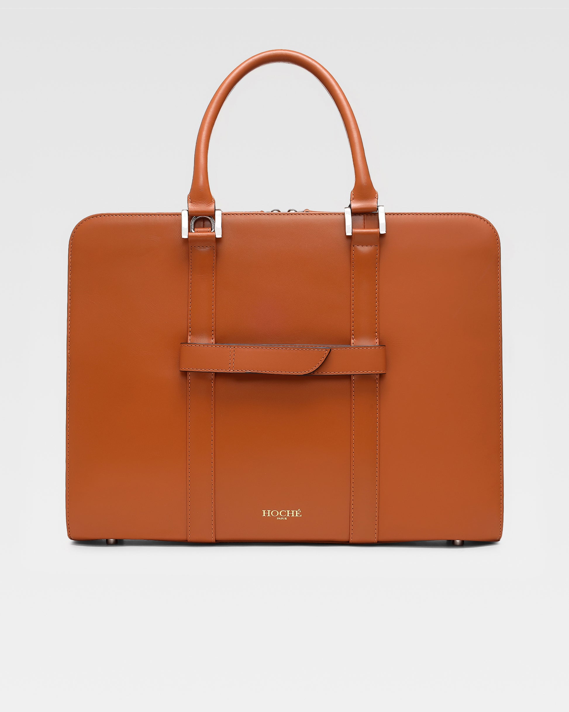 Back view of PinnaclePro Umber Tan genuine leather laptop bag for men in India, showcasing a detachable trolley strap, reinforced handles, and a sleek finish